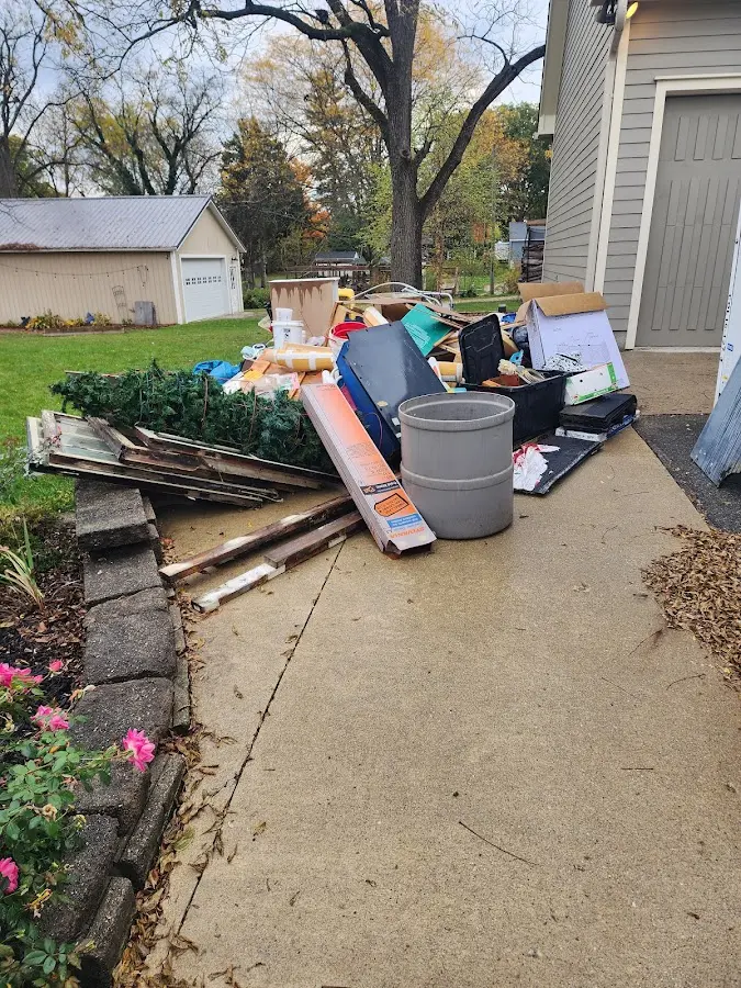 Dumpster being loaded with debris for 10 Yard Dumpster Rental in Lower Swatara